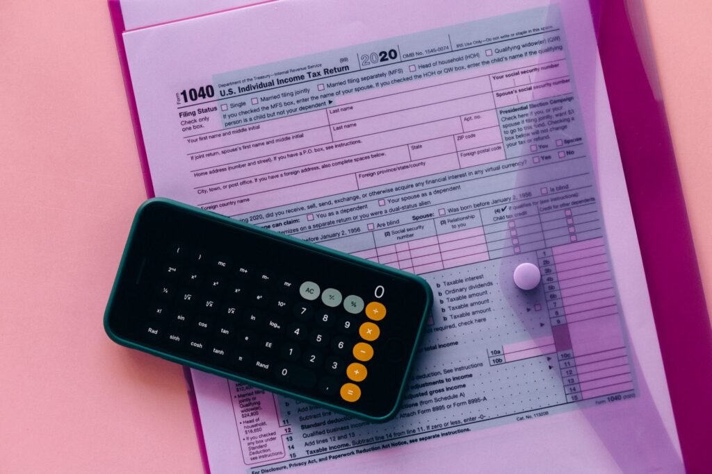 US federal tax form 1040 with a calculator