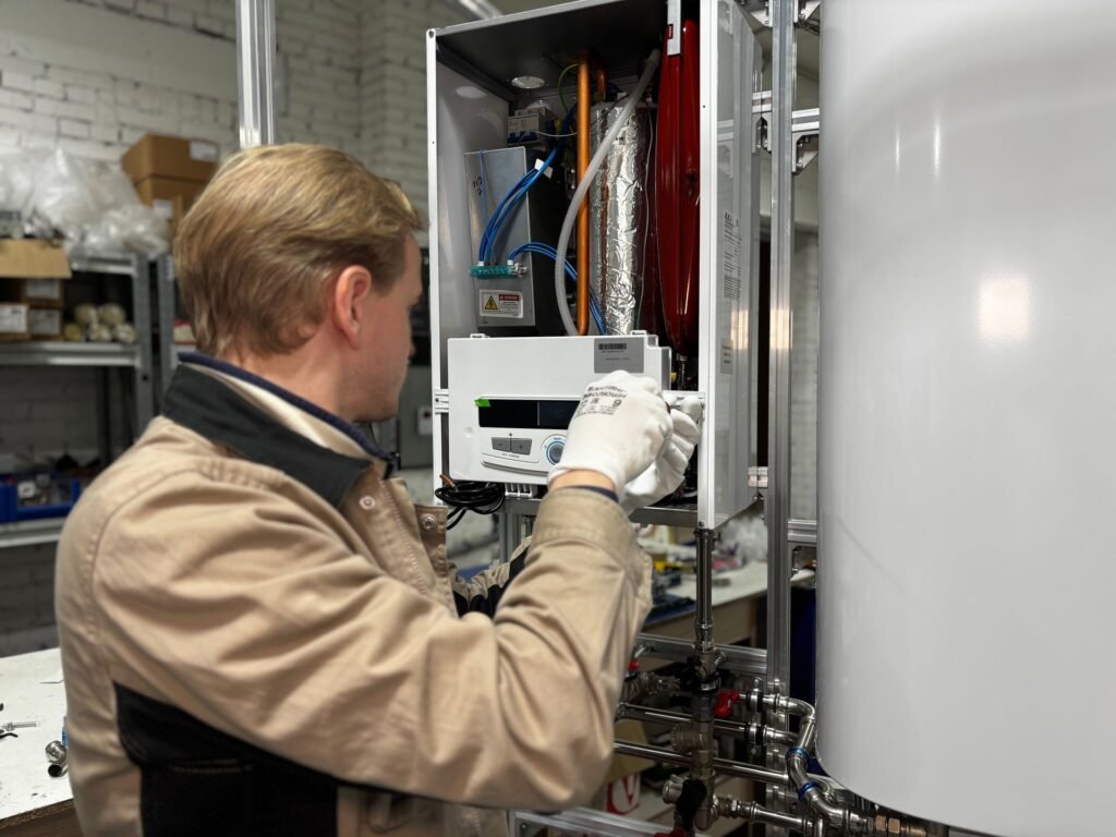 Technician repairing a home heating system